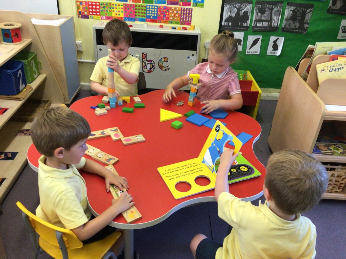 Knowsley Village School logo