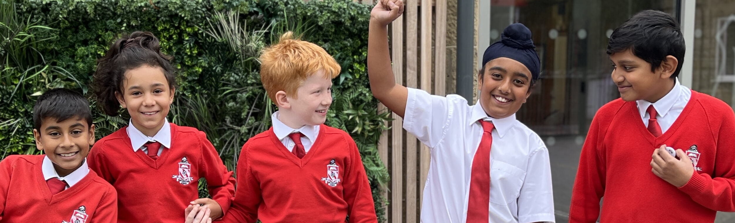 The Froebelian School logo